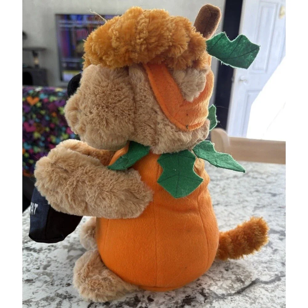 Avon Halloween Singing Dog w/ Trick or Treat Bag Pumpkin Outfit We Got the Treat